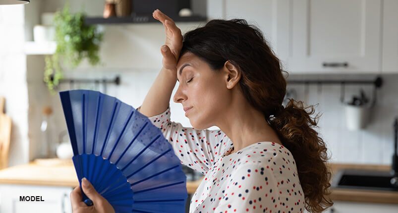 woman with fan