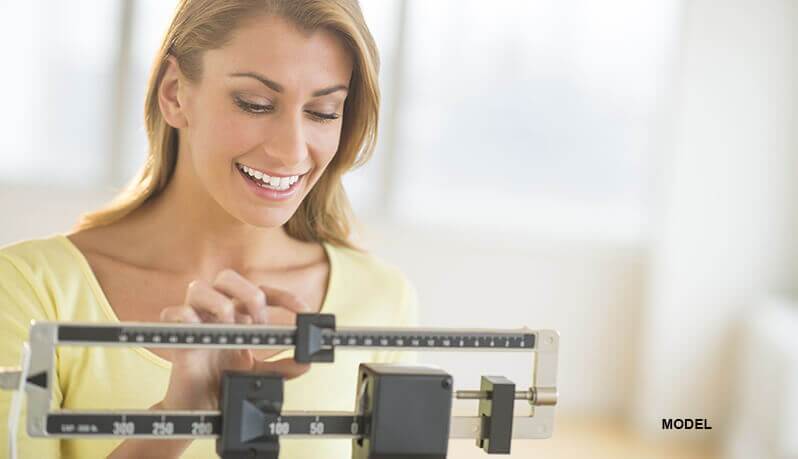 weight loss woman happy